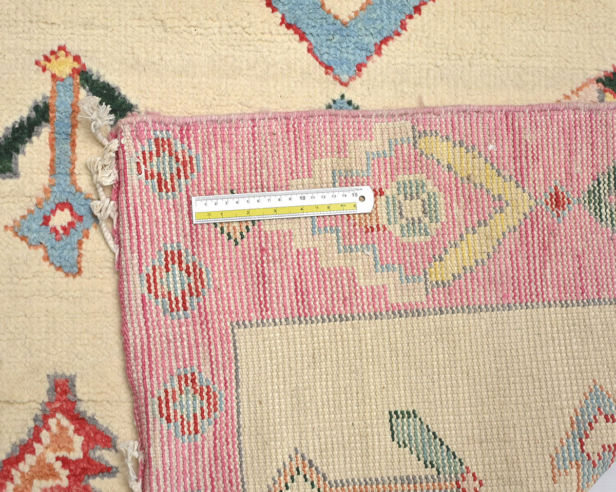 Alfombra marroquí de lana tejida a mano en beige de 4 metros