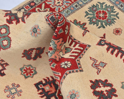 Alfombra afgana Kuba beige de lana anudada a mano de 4x6