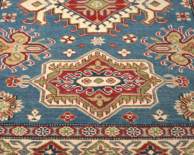 Alfombra afgana Kuba de lana azul anudada a mano de 4x6