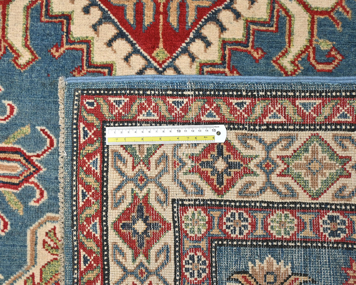 Alfombra afgana Kuba de lana azul anudada a mano de 4x6
